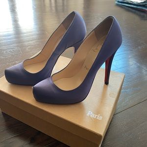 Purple sateen heels. Like new. Worn 2-3 times.